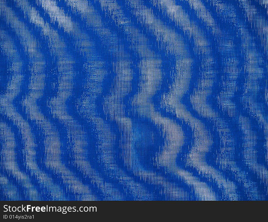 Fabric mesh background swirling with cobalt and cyan light and dark areas.  Can be used horizontally or vertically. Fabric mesh background swirling with cobalt and cyan light and dark areas.  Can be used horizontally or vertically.