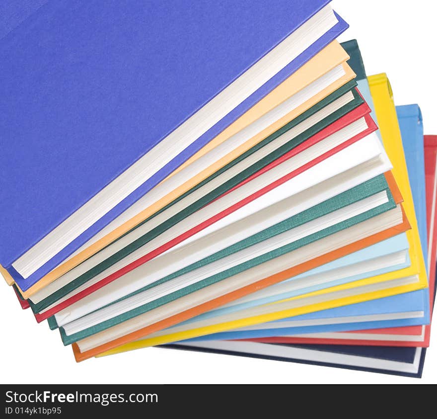 Stacked books on white background