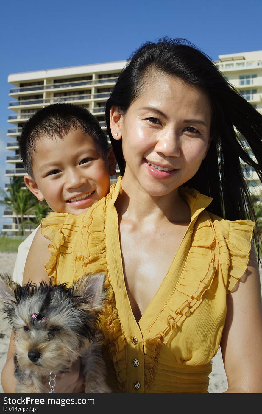 Young mother and her son smiling.