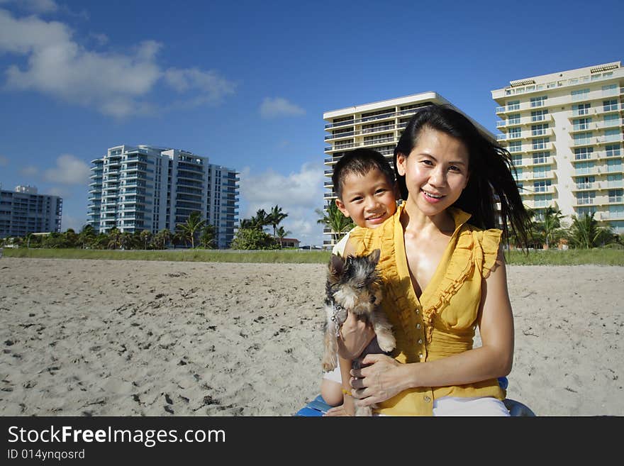 Young mother and her son smiling.