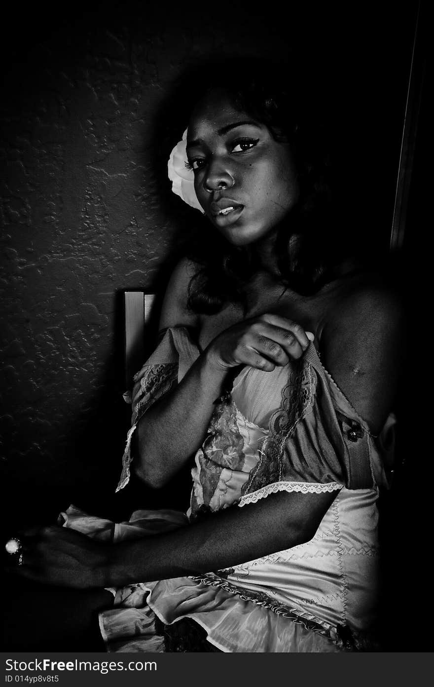 A young african american girl, photographed in the studio.