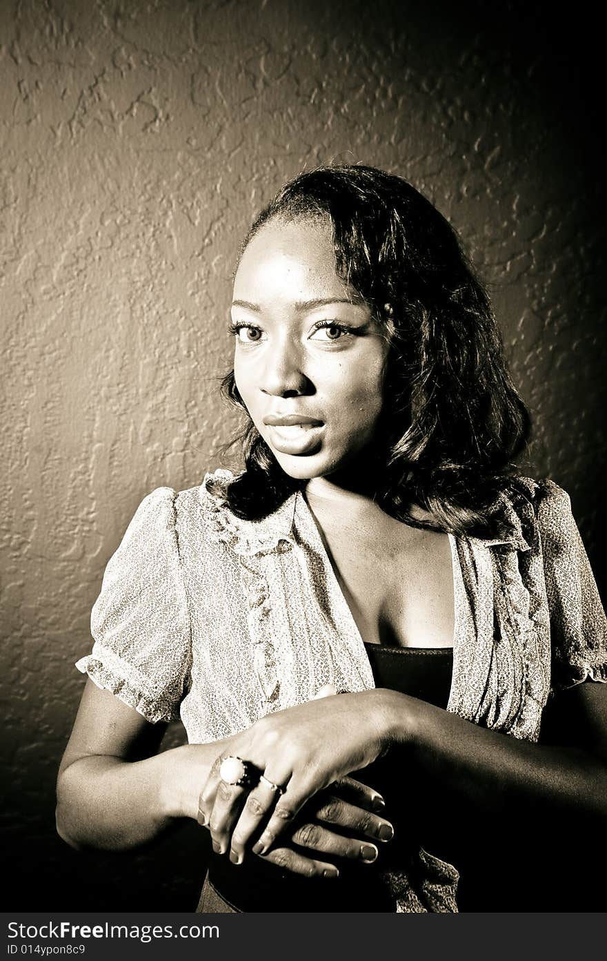 A young african american girl, photographed in the studio.