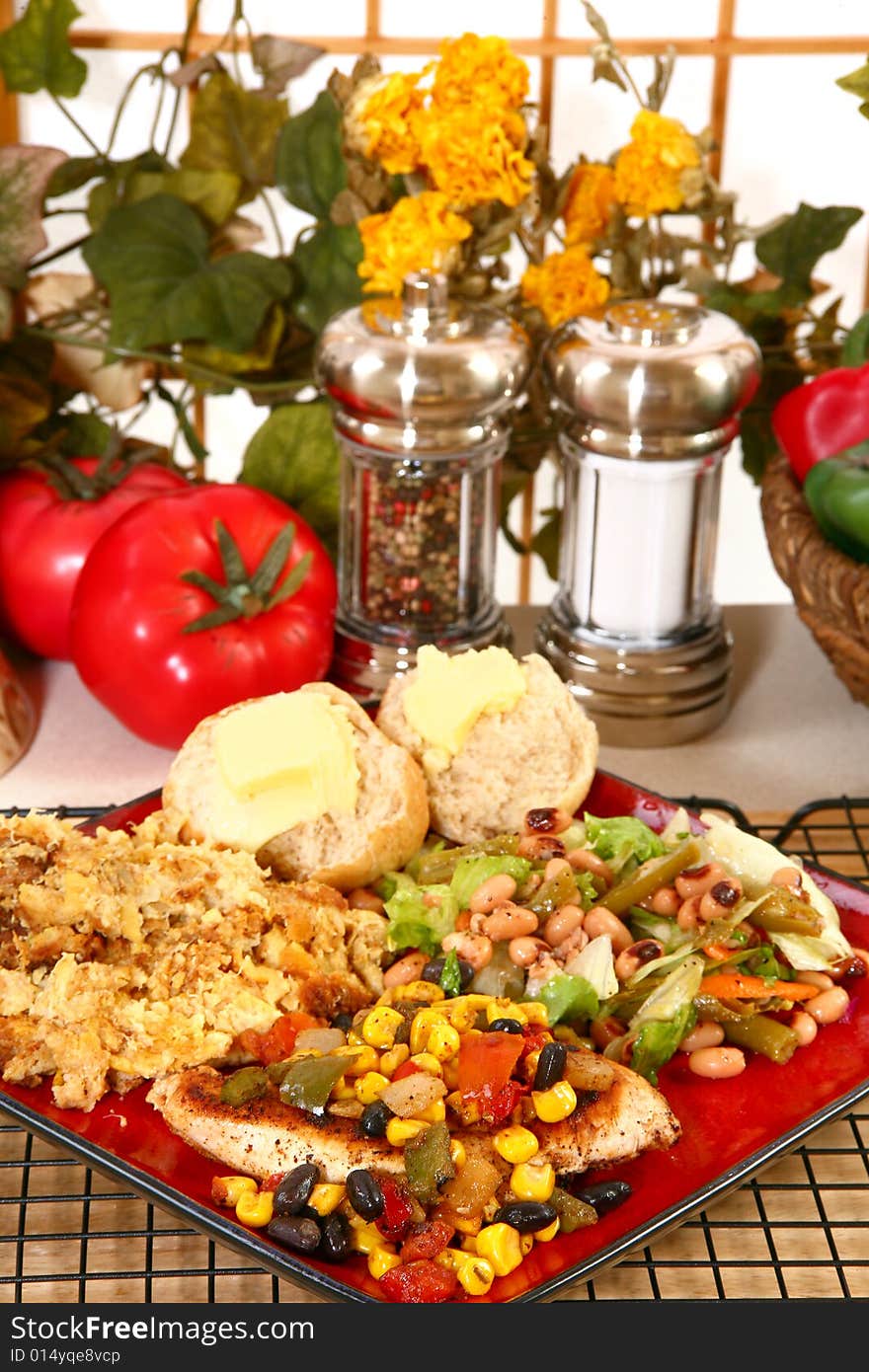 Baked squash with Santa Fe chicken, rolls, baked squash and blackeyed pea salad.