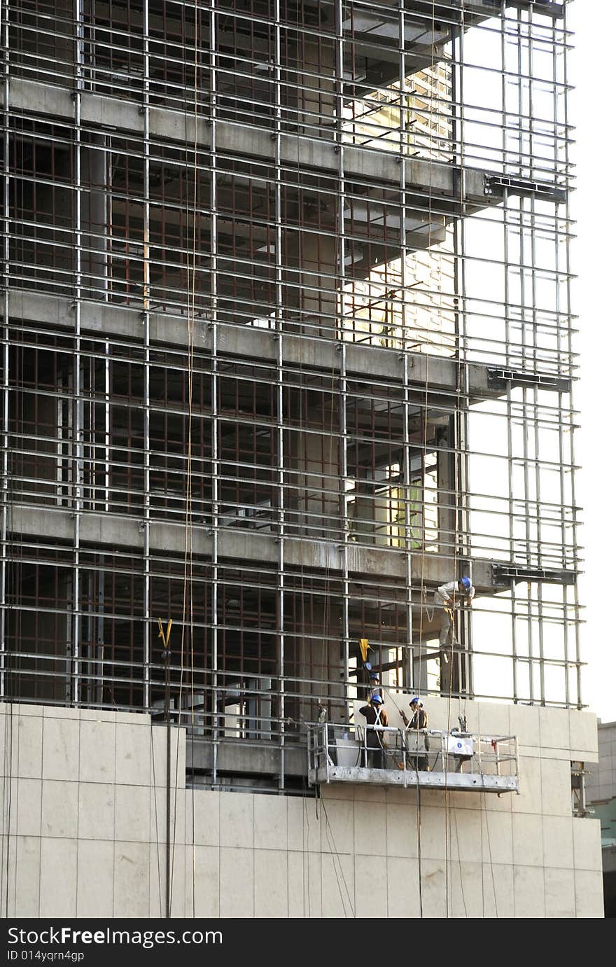 Ongoing building site, building worker