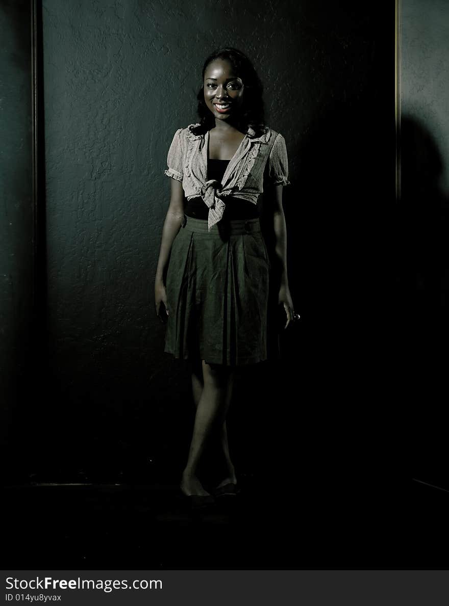 A young african american girl, photographed in the studio.