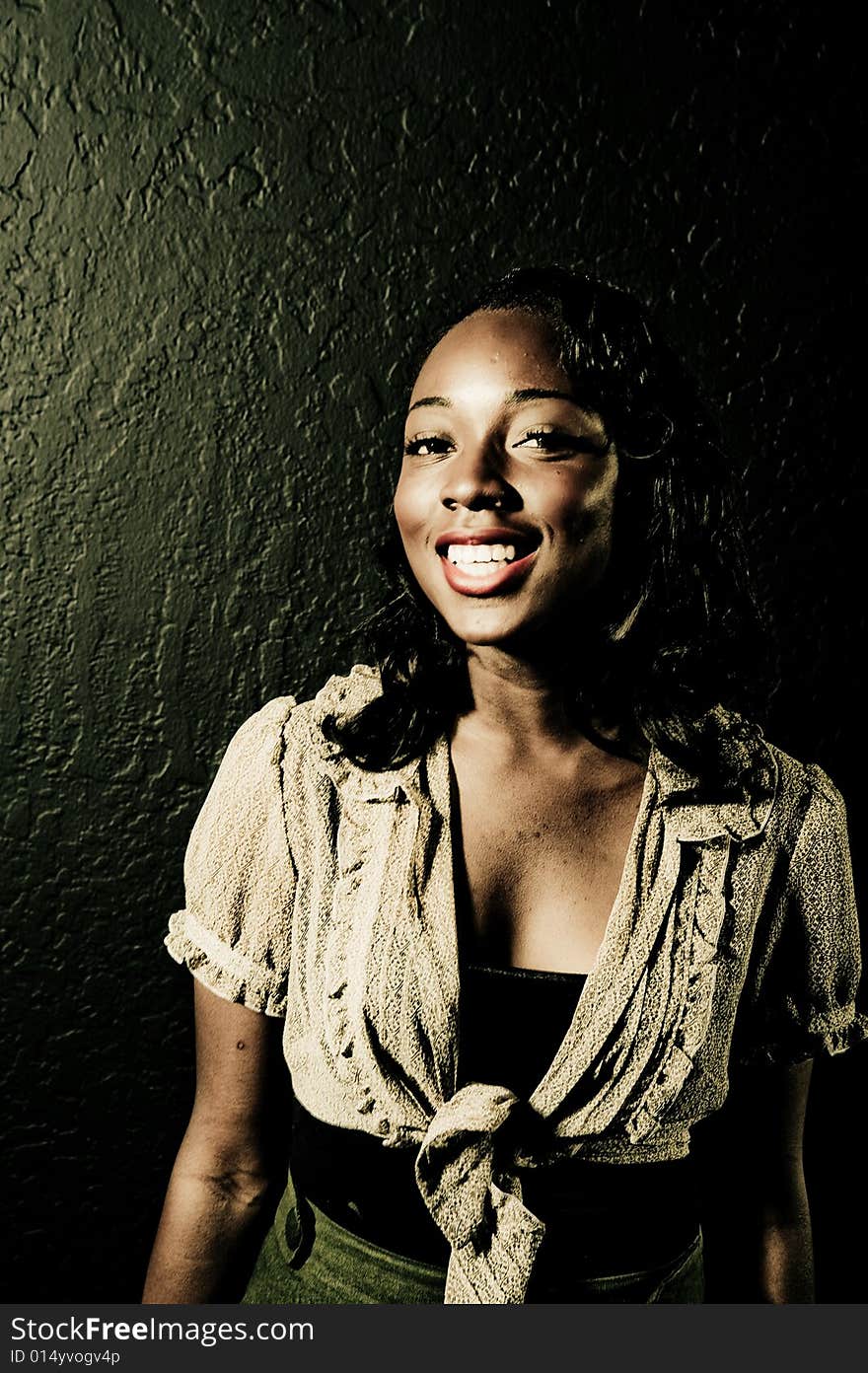 A young african american girl, photographed in the studio.