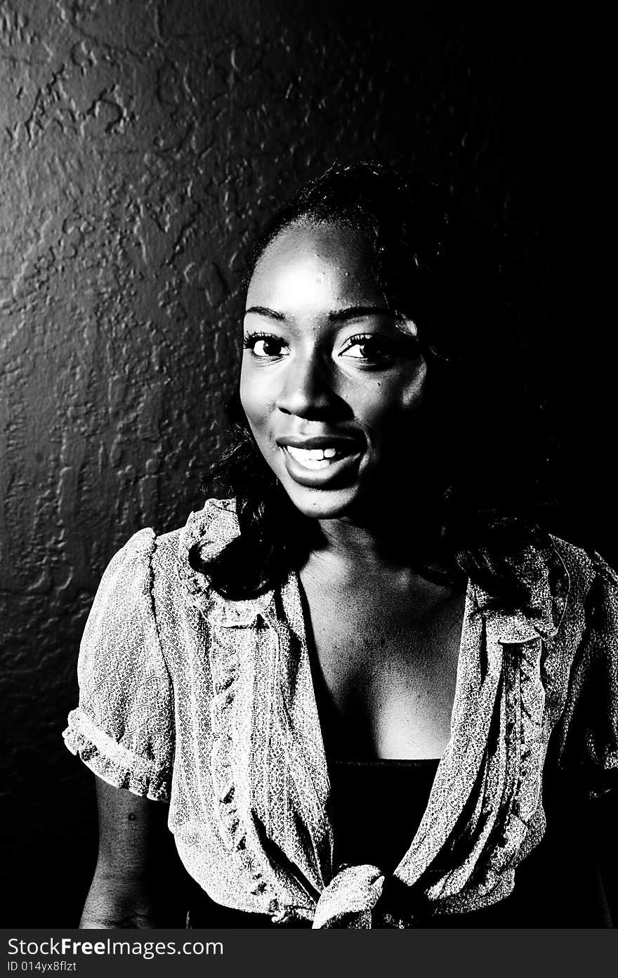 A young african american girl, photographed in the studio.