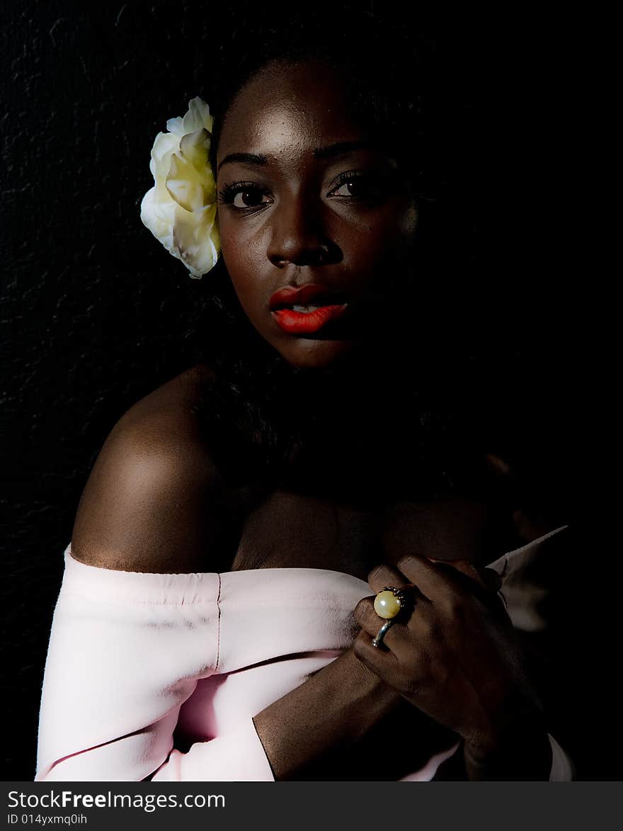 A young african american girl, photographed in the studio.