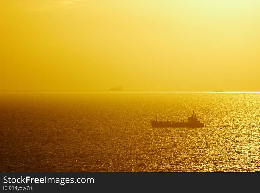 The ship at sea,In sunrise time. The ship at sea,In sunrise time.