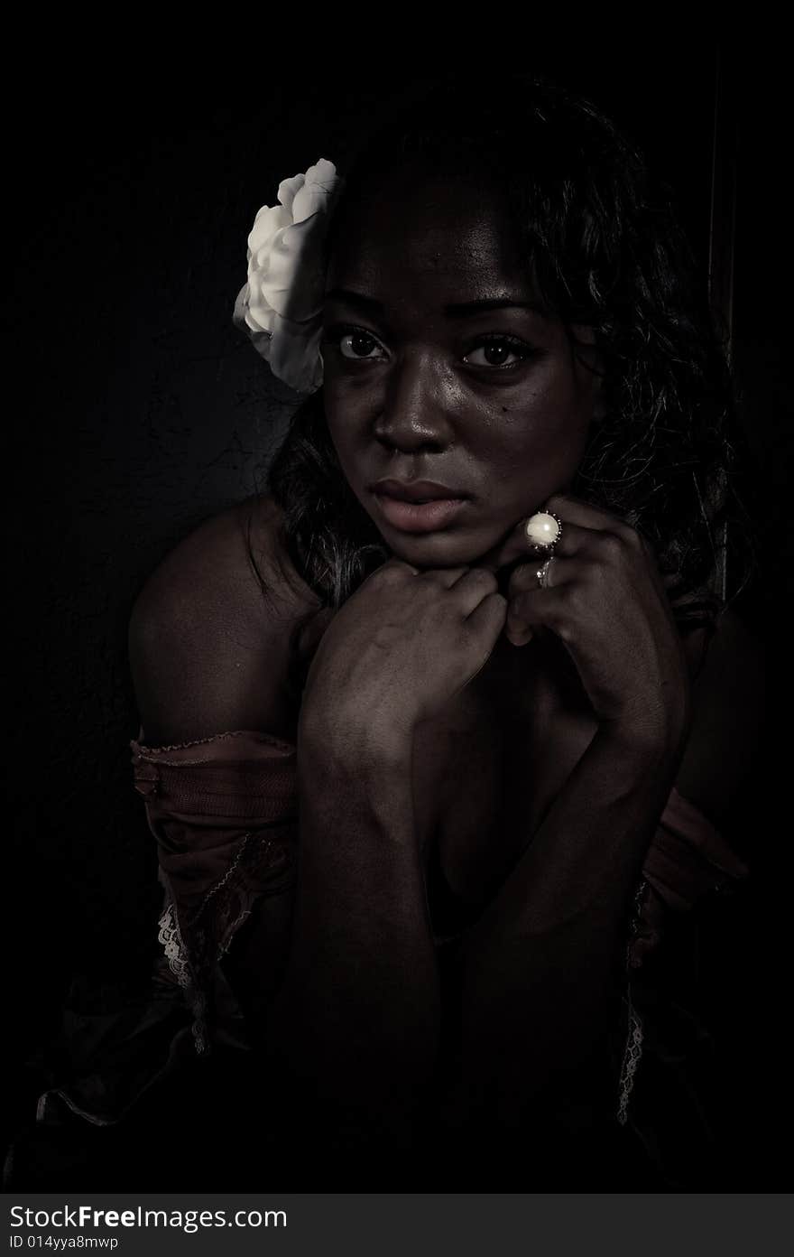 A young african american girl, photographed in the studio.