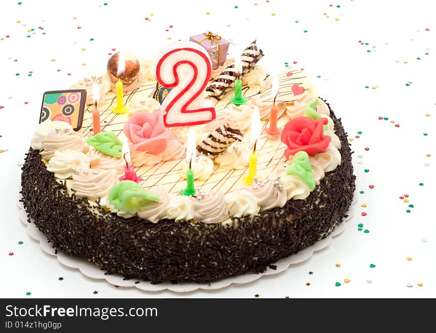 Cake with candle on white background