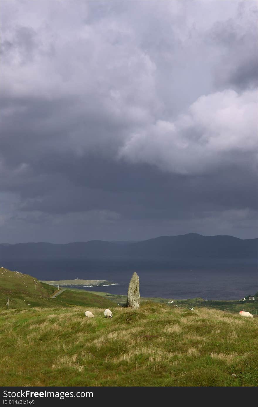 An ancient stone marker on a hill on bear island on the west coast of ireland