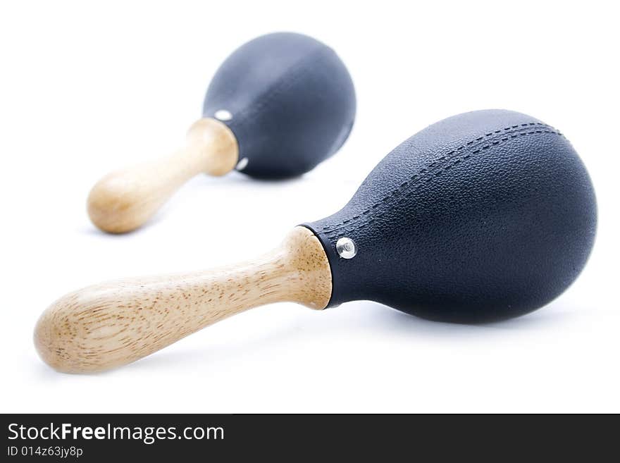 Pair of black plastic maracas isolated on white