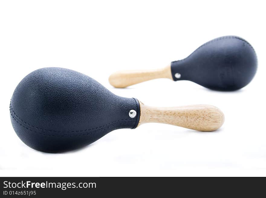 Pair of black plastic maracas isolated on white