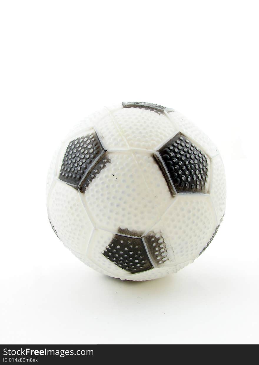 Childrens toy, plastic ball isolated over white background.