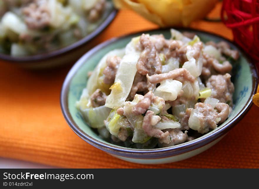 A meal of fresh chicory and some meat. A meal of fresh chicory and some meat