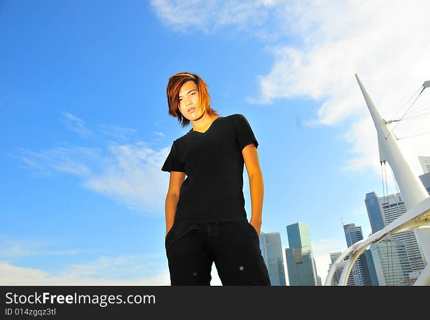 Picture of a long hair youth, rebellious and ready to rock. Useful for illustrating youths in society and Generation Z. Picture of a long hair youth, rebellious and ready to rock. Useful for illustrating youths in society and Generation Z.