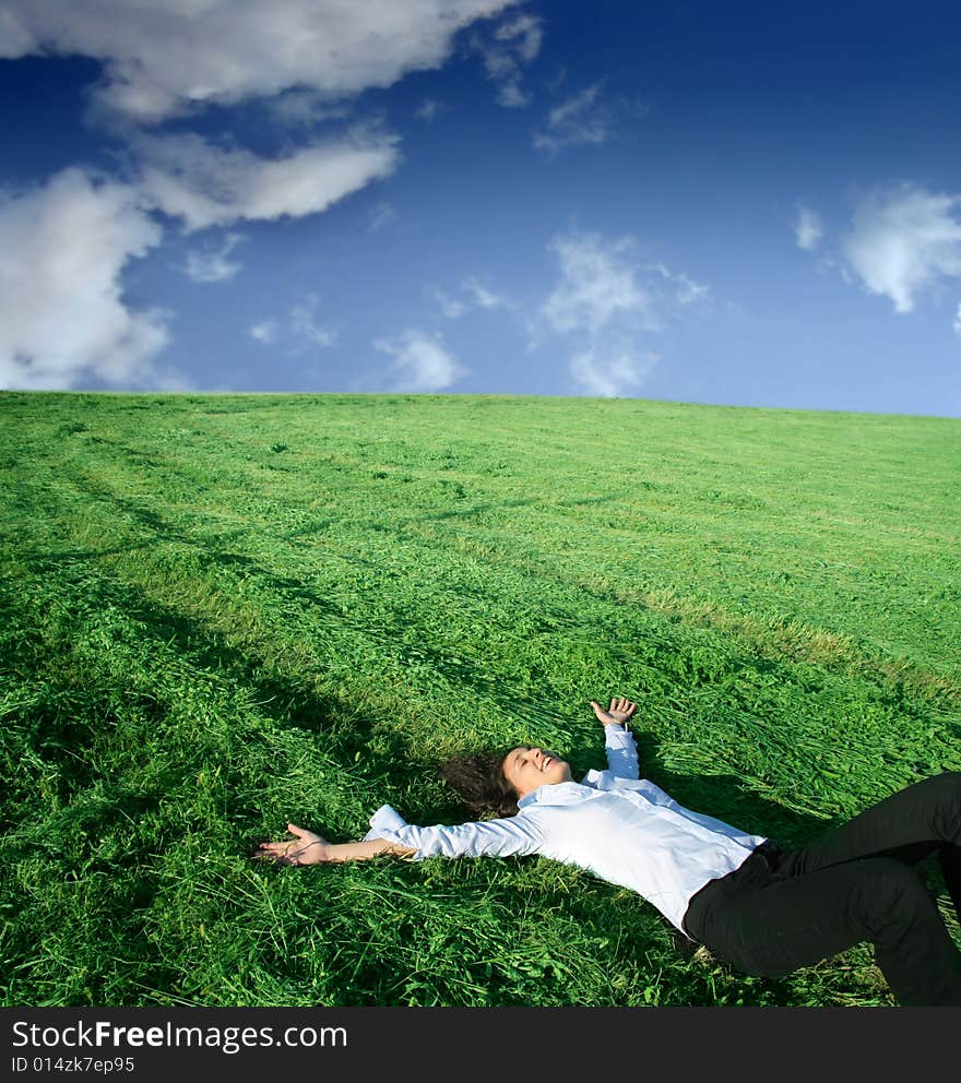 Young woman on the grass field. Young woman on the grass field