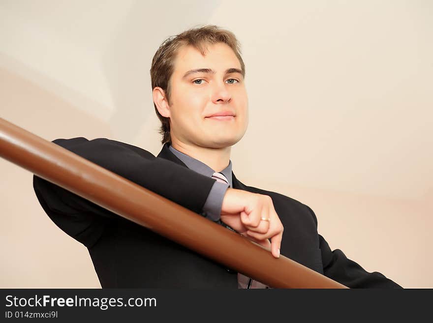 Business background: handsome businessman in a work process. Business background: handsome businessman in a work process.