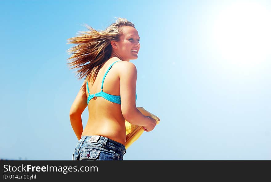 Young attractive woman enjoying summertime. Young attractive woman enjoying summertime