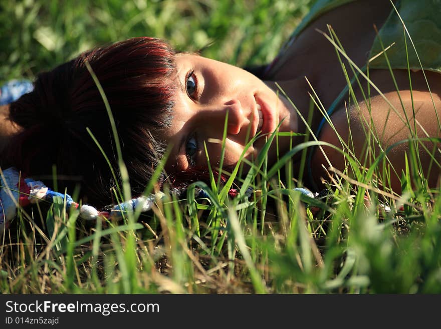 Beautiful girl smile and resting outdoors. Beautiful girl smile and resting outdoors