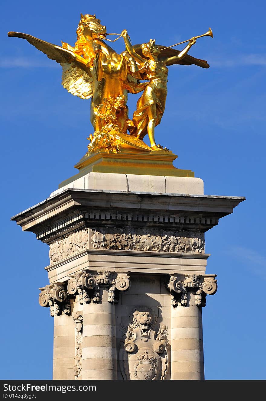 France; Paris; Bronze and golden leaf statue