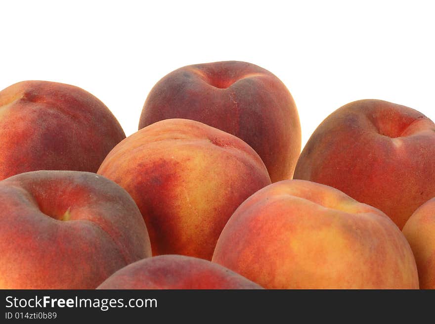 Fresh peaches on white background