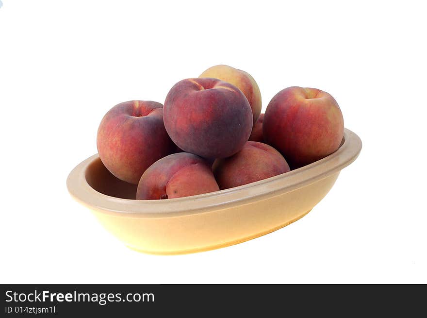 Fresh peaches on white background