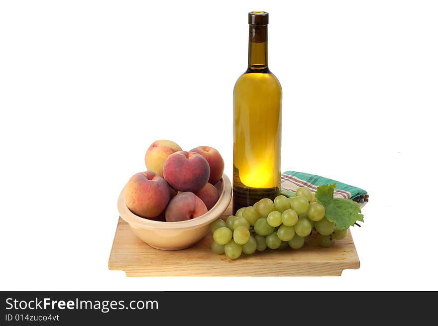 Bottle of vine and some fruits