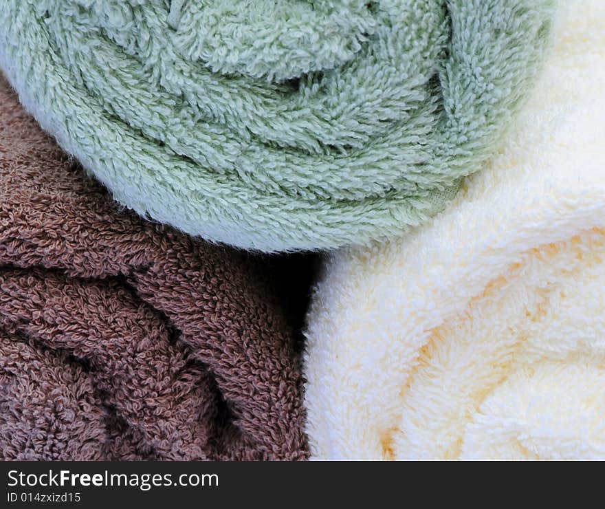 Three rolled up towels,an ideal background. Three rolled up towels,an ideal background