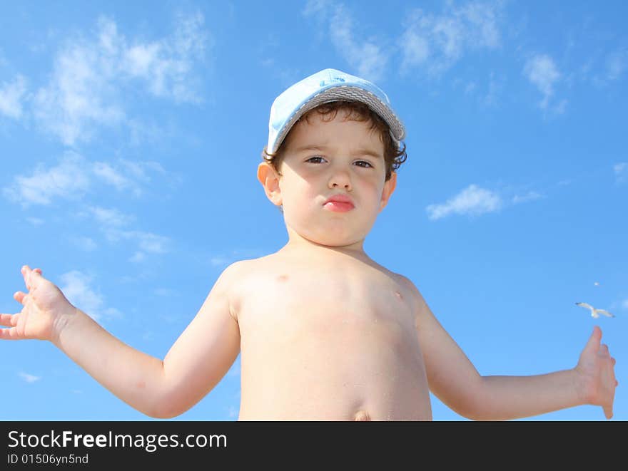 3 year old boy against the sky. 3 year old boy against the sky