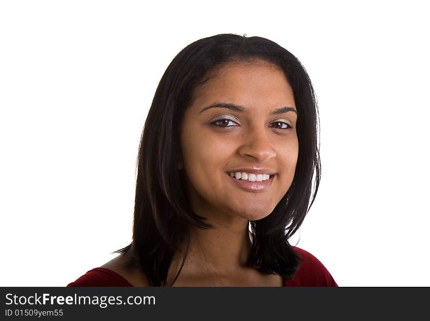 A head shot of a dark haired beauty isolated on white. A head shot of a dark haired beauty isolated on white