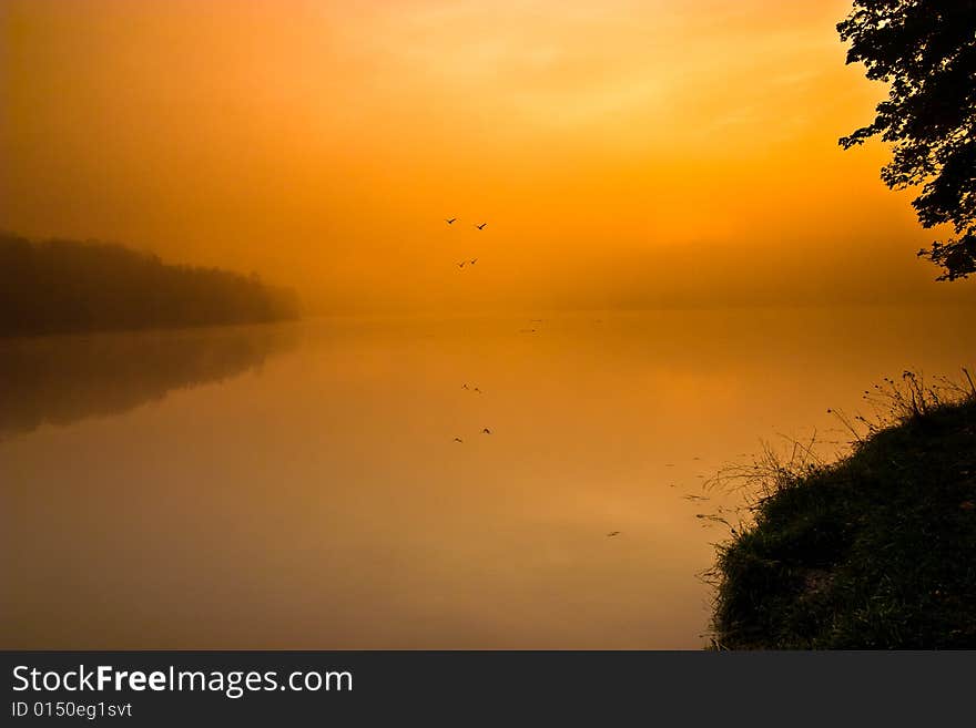 Hazy smoggy morning sunrise shining through. Hazy smoggy morning sunrise shining through