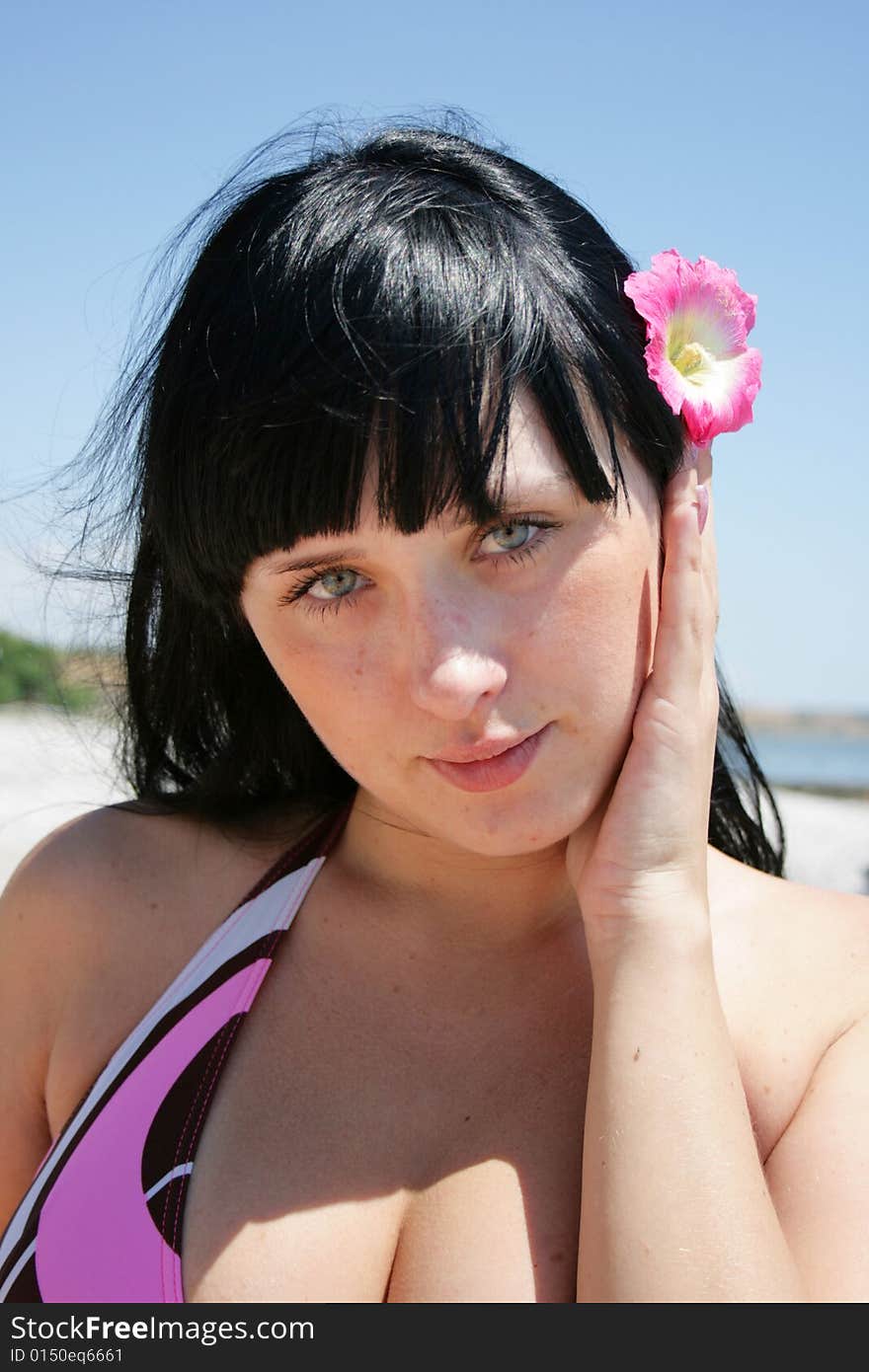 Picture of pretty girl relaxing on the beach