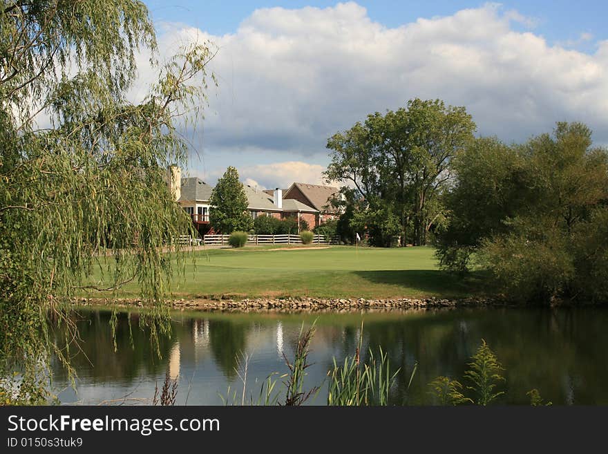 A scenic golf course community and pond