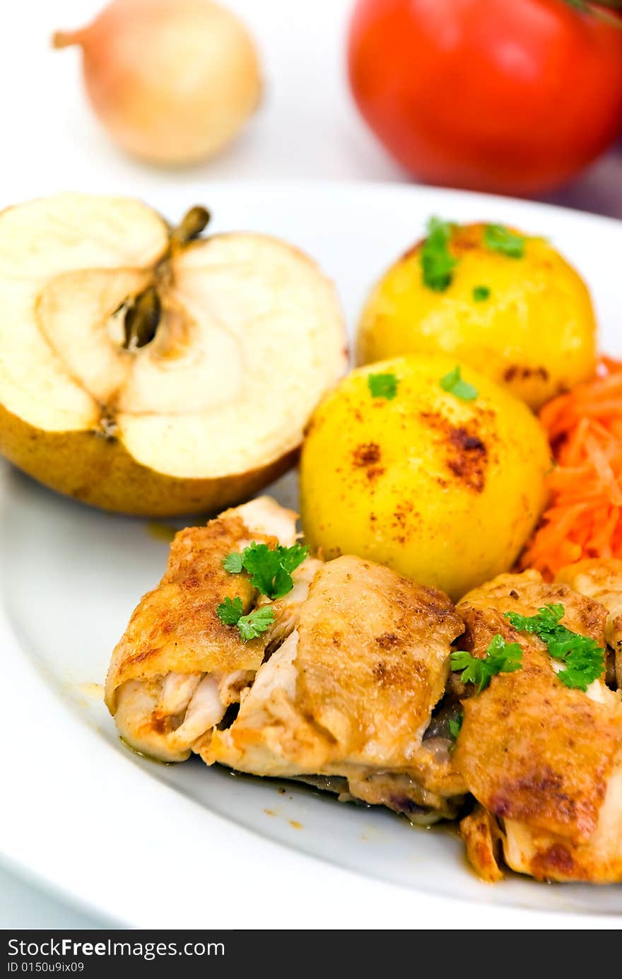 Roasted chicken with apple and fried potatoes