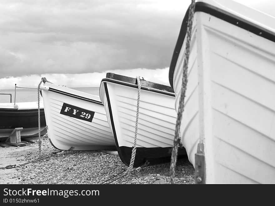 Fishing boats and gathering storm