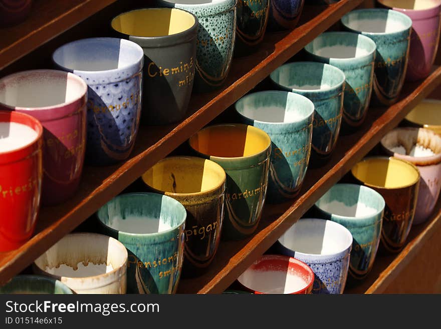 Pyramid of bright cups , background