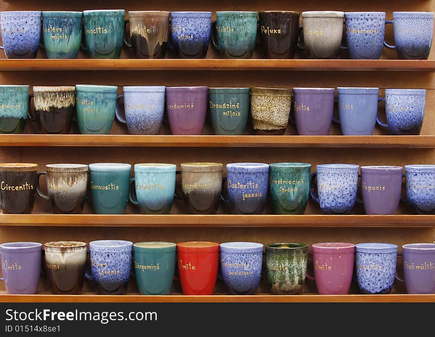 Pyramid of bright cups , background