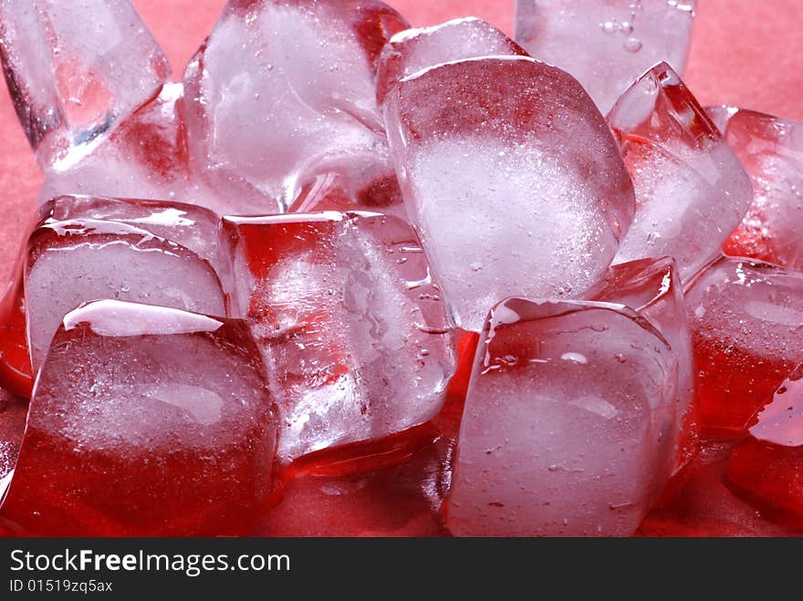 Ice cubes in red background. Ice cubes in red background