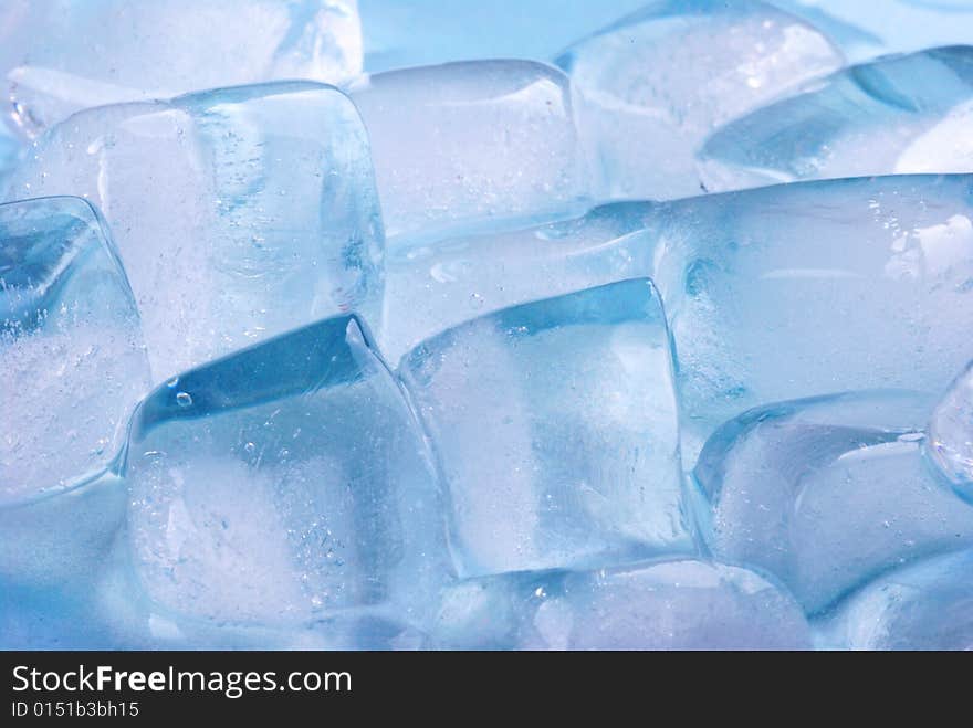 Ice cubes in blue background. Ice cubes in blue background