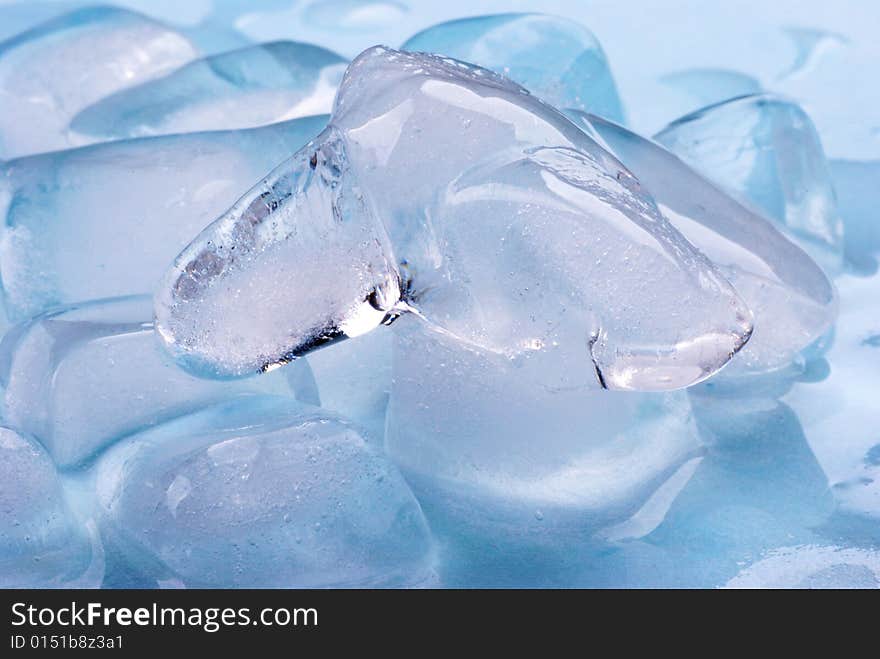 Ice cubes in blue background. Ice cubes in blue background