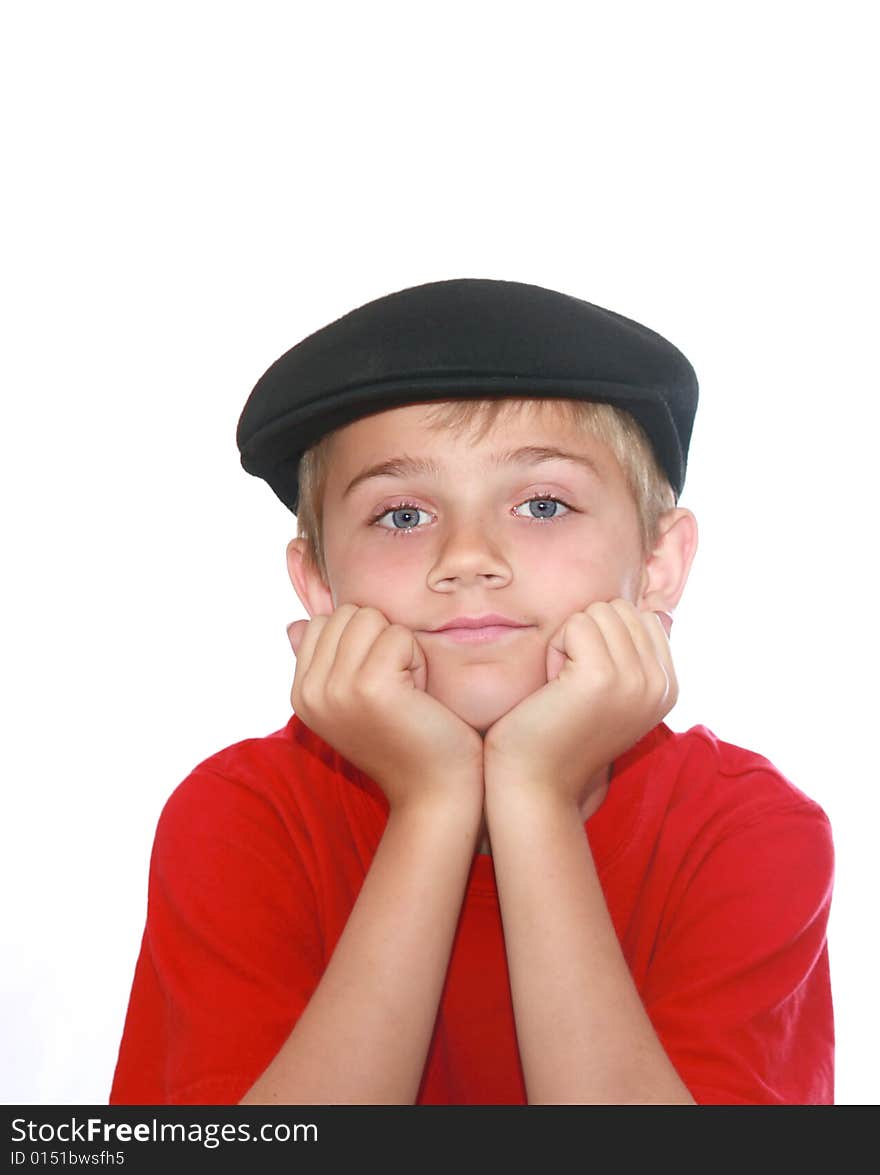 Cute boy with chin in hand, gazing wistfully into the camera, isolated on white. Cute boy with chin in hand, gazing wistfully into the camera, isolated on white.