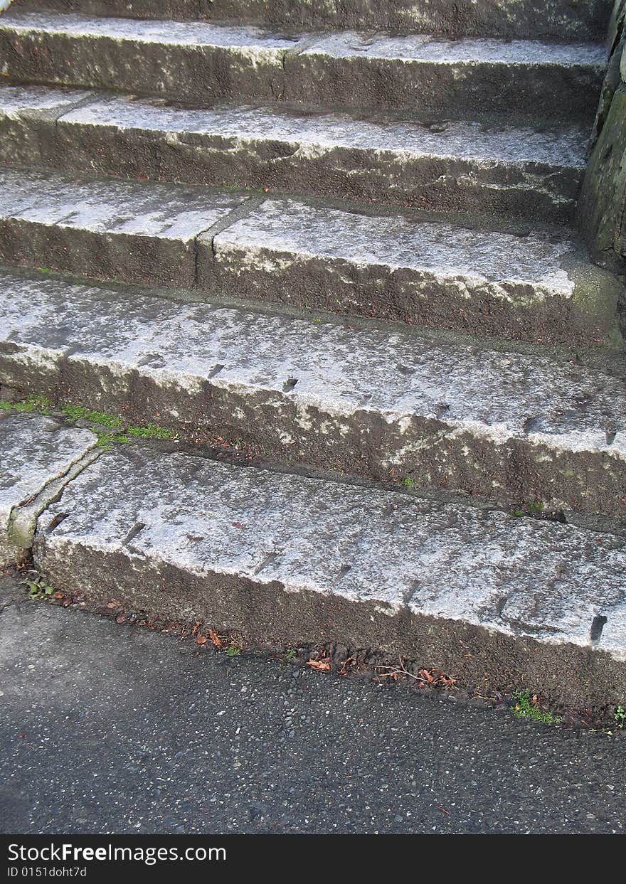 Old dark outdoor stone steps