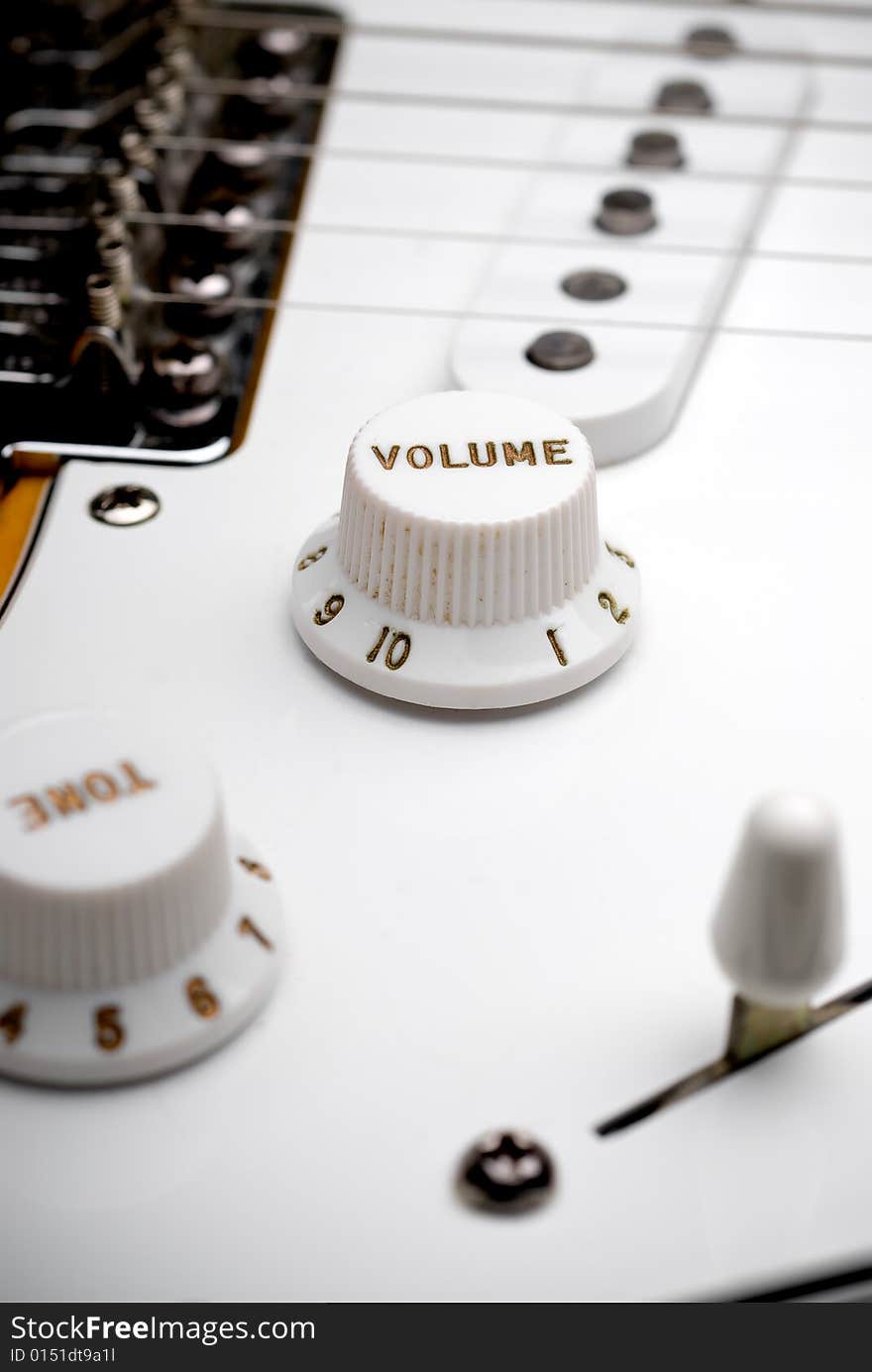 Closeup of a guitar volume control knob