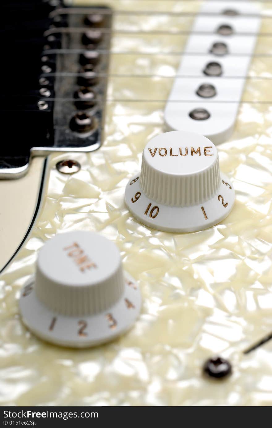 Closeup of a guitar volume control knob