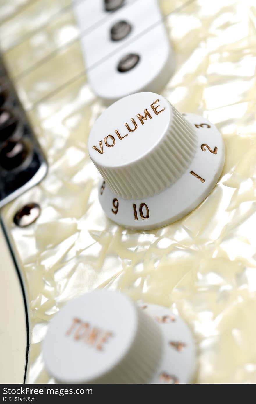 Closeup of a guitar volume control knob