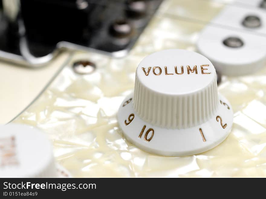 Closeup of a guitar volume control knob