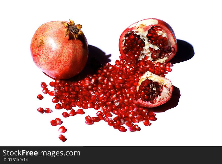 Fresh half and full pomegranate