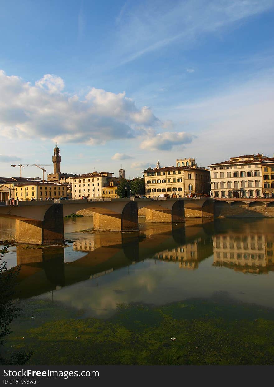 A wonderful landscape of Arno river, bridge and monuments in Florence